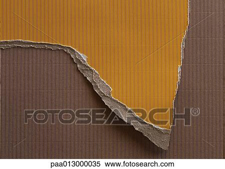 Stock Photography - Ripped piece of yellow corrugated paper, on top of brown corrugated paper, close-up, full frame.. Fotosearch