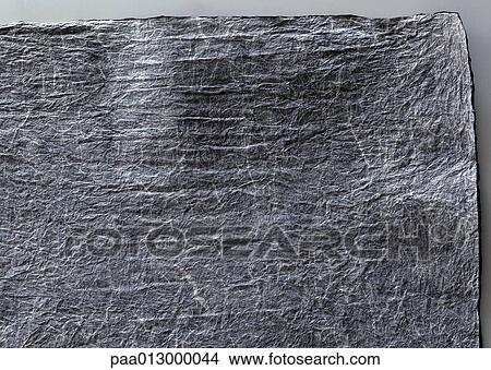 Wrinkled grey paper View Large Photo Image Picture - Wrinkled grey paper. Fotosearch