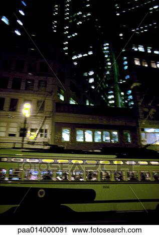 Buildings and mass transportation at night. View Large Photo Image Stock Image - Buildings and mass transportation at night.. Fotosearch