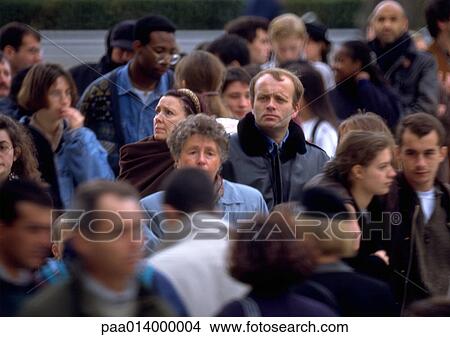 Crowd, blurred, focus on individual. View Large Photo Image Picture - Crowd, blurred, focus on individual.. Fotosearch