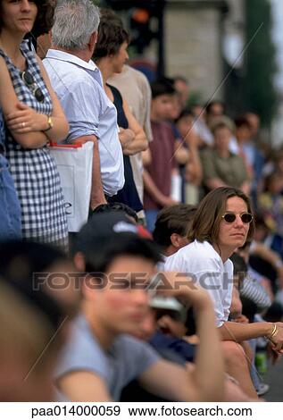 Crowd of people sitting in bleachers View Large Photo Image Stock Photo - Crowd of people sitting in bleachers. Fotosearch