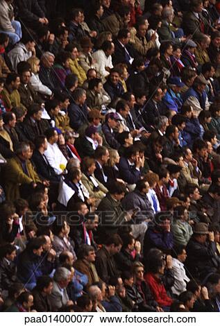 Stock Photo - Crowd sitting in stadium. Fotosearch