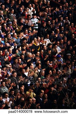 Stock Photo - Crowd sitting in stadium. Fotosearch