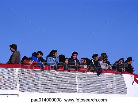 Group of people on boat tour, low angle view View Large Photo Image Stock Photo - Group of people on boat tour, low angle view. Fotosearch