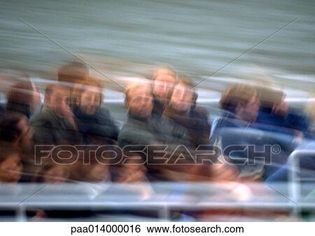 Stock Photograph - People on tour in motion, blurred.. Fotosearch