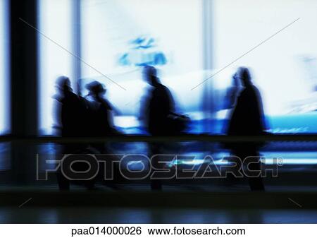 Silhouette of people in airport in front of windows, blurred. View Large Photo Image Stock Photograph - Silhouette of people in airport in front of windows, blurred.. Fotosearch