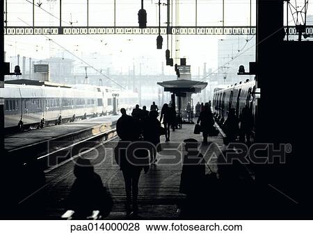 Silhouettes of people on train platform, blurred. View Large Photo Image Stock Photo - Silhouettes of people on train platform, blurred.. Fotosearch