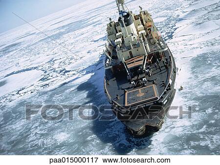 Boat in frozen water View Large Photo Image Stock Photo - Boat in frozen water. Fotosearch