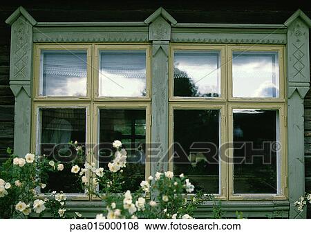 Stock Photo - Norway, window with woodwork. Fotosearch