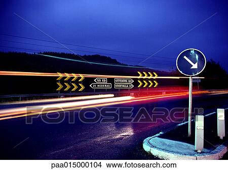 Road with light trails at night View Large Photo Image Picture - Road with light trails at night. Fotosearch