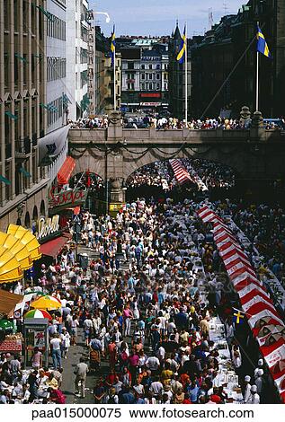 Stock Photography - Sweden, Stockholm, crowd in street, high angle view. Fotosearch