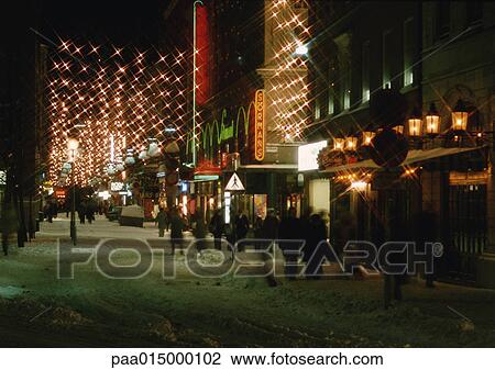 Stock Image - Sweden, Stockholm, shops at night. Fotosearch