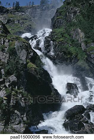Waterfall in rocky landscape View Large Photo Image Stock Photograph - Waterfall in rocky landscape. Fotosearch
