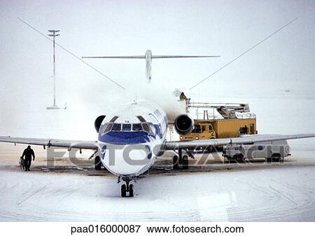 Finland, plane on snowy runway View Large Photo Image Stock Photo - Finland, plane on snowy runway. Fotosearch