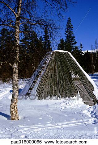 Stock Photograph - Finland, wooden shed in snow. Fotosearch
