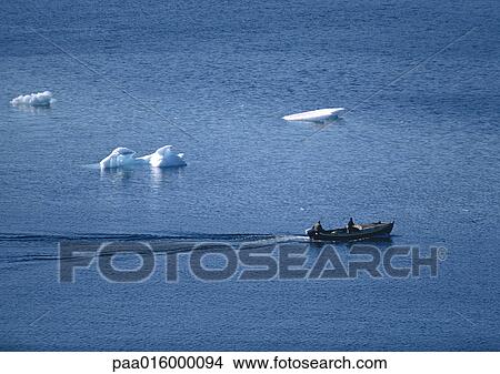 Greenland, boat in sea with icebergs View Large Photo Image Picture - Greenland, boat in sea with icebergs. Fotosearch