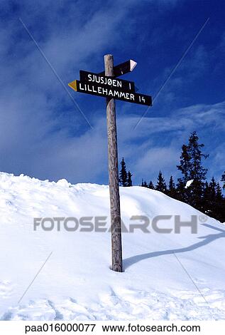 Stock Photo - Norway, direction sign in snow. Fotosearch
