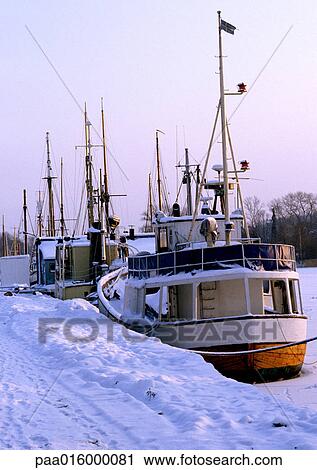Sweden, boats docked in snow View Large Photo Image Stock Image - Sweden, boats docked in snow. Fotosearch