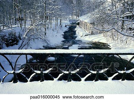 Sweden, snow-covered guard rail in front of snow covered woods and house, next to stream View Large Photo Image Stock Photography - Sweden, snow-covered guard rail in front of snow covered woods and house, next to stream. Fotosearch