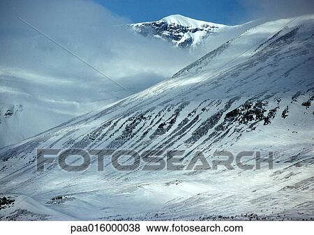Sweden, snow-covered mountains, close-up View Large Photo Image Stock Photo - Sweden, snow-covered mountains, close-up. Fotosearch