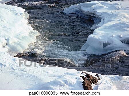 Sweden, snow-covered river View Large Photo Image Stock Photography - Sweden, snow-covered river. Fotosearch