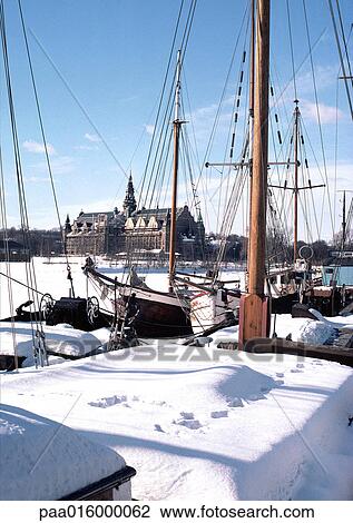 Sweden, Stockholm, boats in foreground, church in distance, under snow View Large Photo Image Stock Image - Sweden, Stockholm, boats in foreground, church in distance, under snow. Fotosearch