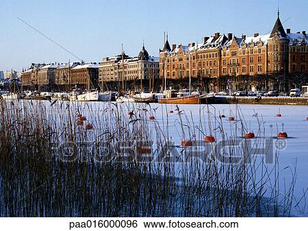 Sweden, Stockholm, snow covered harbor and buildings along quay View Large Photo Image Stock Photograph - Sweden, Stockholm, snow covered harbor and buildings along quay. Fotosearch