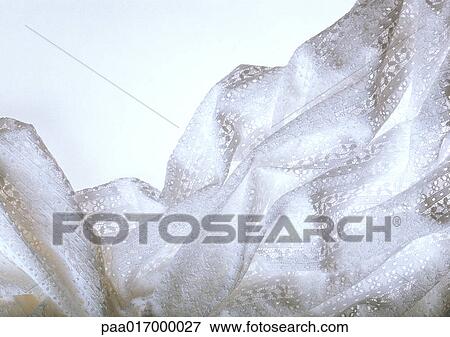 Crumpled white fabric, close-up View Large Photo Image Stock Photo - Crumpled white fabric, close-up. Fotosearch