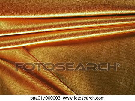 Folded gold fabric, close-up, full frame View Large Photo Image Stock Image - Folded gold fabric, close-up, full frame. Fotosearch