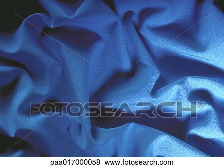 Folds in blue fabric, close-up, full frame View Large Photo Image Stock Photo - Folds in blue fabric, close-up, full frame. Fotosearch