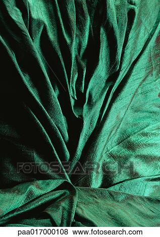 Folds in green fabric, close-up, full frame View Large Photo Image Stock Photo - Folds in green fabric, close-up, full frame. Fotosearch
