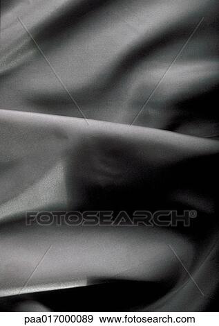 Folds in grey fabric, close-up, full frame View Large Photo Image Stock Photo - Folds in grey fabric, close-up, full frame. Fotosearch