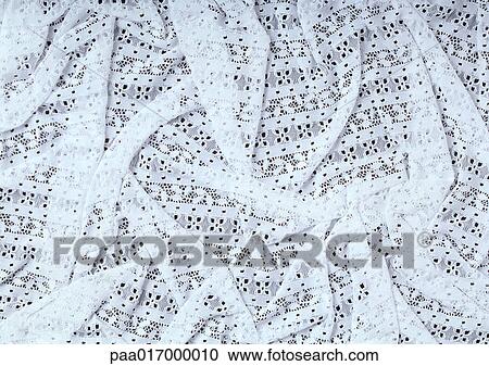 Folds in white eyelet fabric, close-up, full frame View Large Photo Image Stock Image - Folds in white eyelet fabric, close-up, full frame. Fotosearch