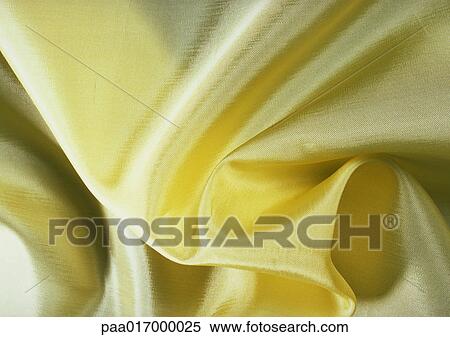 Folds in yellow silk, close-up, full frame View Large Photo Image Stock Photography - Folds in yellow silk, close-up, full frame. Fotosearch