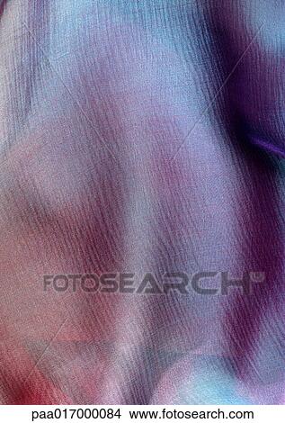 Iridescent fabric, close-up, full frame View Large Photo Image Picture - Iridescent fabric, close-up, full frame. Fotosearch
