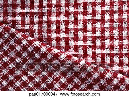 Stock Photo - Red and white checked fabric, close-up, full frame. Fotosearch