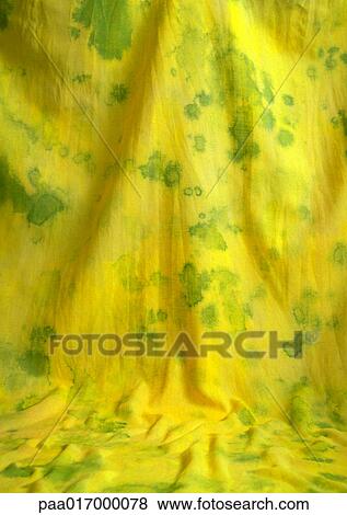 Yellow fabric with green splotches, close-up, full frame View Large Photo Image Stock Photo - Yellow fabric with green splotches, close-up, full frame. Fotosearch