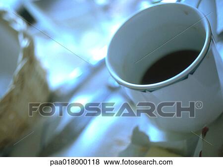 Cup of coffee on table. View Large Photo Image Stock Photo - Cup of coffee on table.. Fotosearch