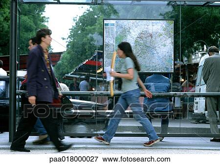 People walking past bus stop, blurred. View Large Photo Image Stock Photo - People walking past bus stop, blurred.. Fotosearch