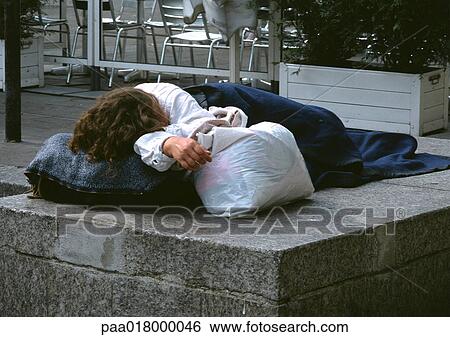 Person sleeping on sidewalk near cafÄ View Large Photo Image Stock Photograph - Person sleeping on sidewalk near cafÄ. Fotosearch