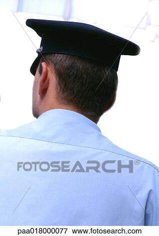 Policeman, rear view. View Large Photo Image Stock Photo - Policeman, rear view.. Fotosearch