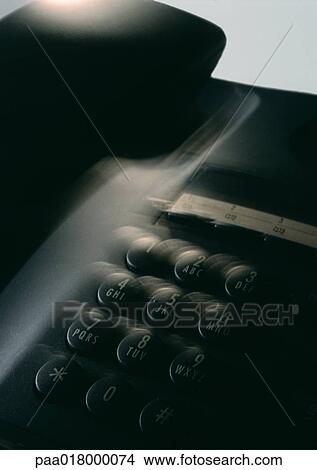 Telephone, blurred close up. View Large Photo Image Picture - Telephone, blurred close up.. Fotosearch