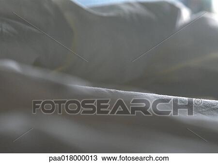 Stock Image - White sheets.. Fotosearch