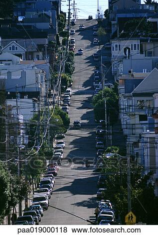 Stock Photo - California, San Francisco, steep city street with cars lining road. Fotosearch
