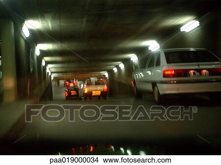 Cars inside a tunnel, blurry. View Large Photo Image Picture - Cars inside a tunnel, blurry.. Fotosearch