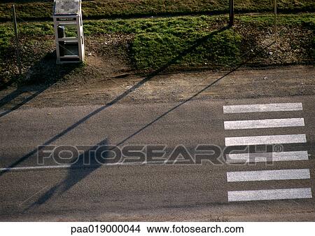 Crosswalk and telephone booth, birdseye view. View Large Photo Image Picture - Crosswalk and telephone booth, birdseye view.. Fotosearch