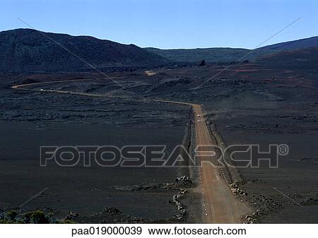 Dirt road through mountainous desert region. View Large Photo Image Stock Photo - Dirt road through mountainous desert region.. Fotosearch