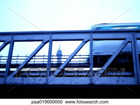 France, Paris, elevated train and eiffel tower in background, blurry. View Large Photo Image Stock Image - France, Paris, elevated train and eiffel tower in background, blurry.. Fotosearch