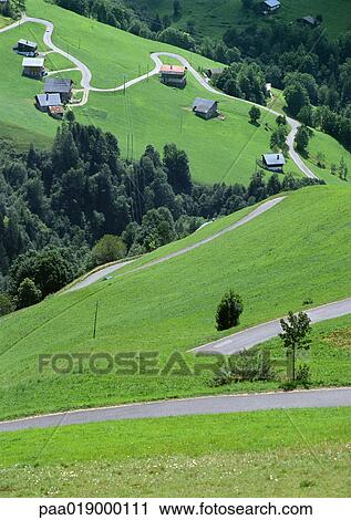 France, Savoie, winding hillside road with houses View Large Photo Image Stock Image - France, Savoie, winding hillside road with houses. Fotosearch
