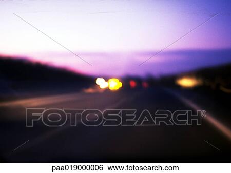 Road at night with cars, blurry. View Large Photo Image Stock Photograph - Road at night with cars, blurry.. Fotosearch
